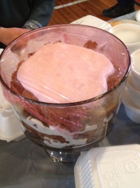 a dessert in a glass bowl on a table