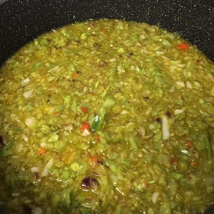 the food is prepared and ready to be cooked in the pot on the stove top