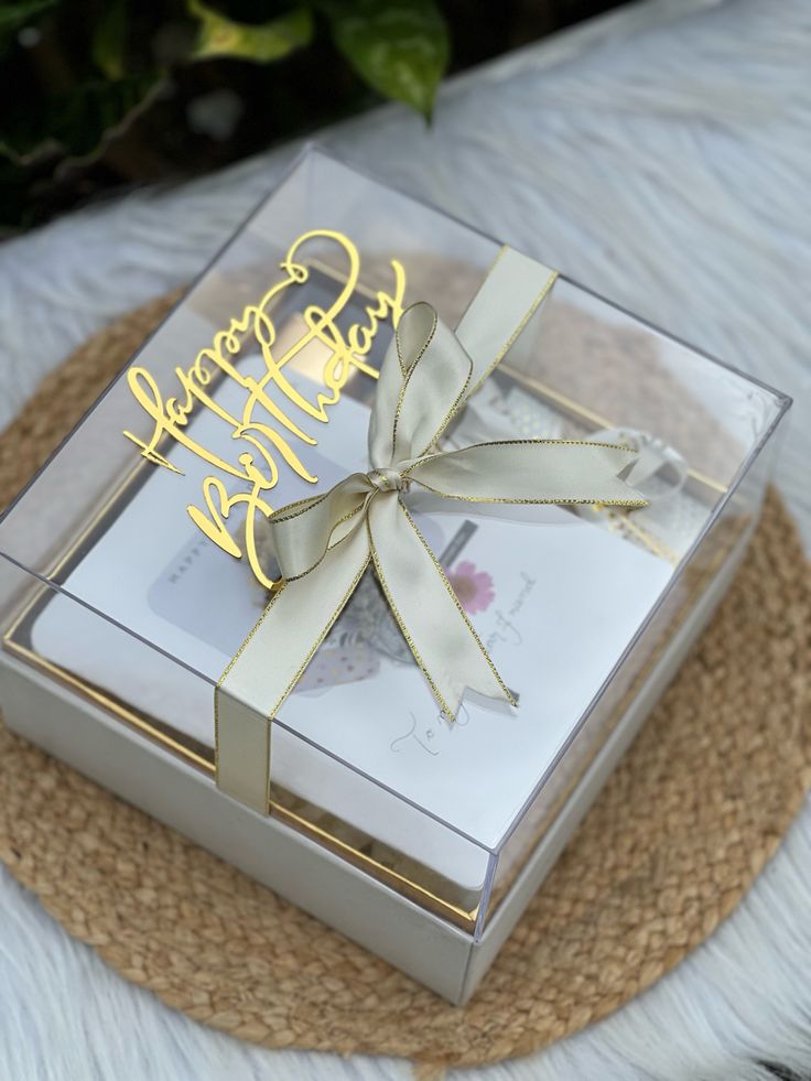 a gift box with a ribbon and congratulations message