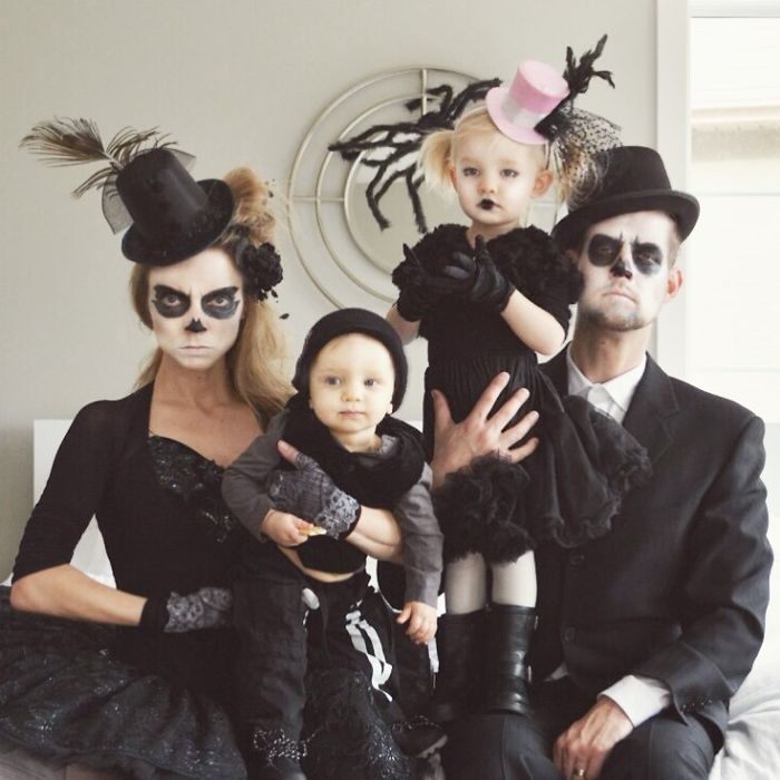 the family is dressed up for halloween