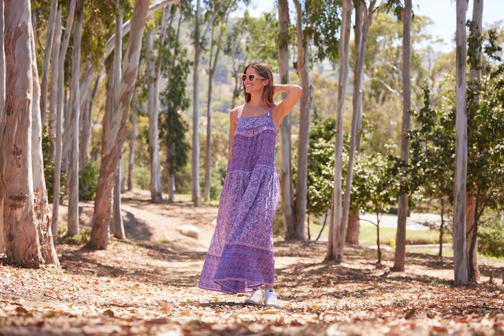 The Betsy long dress is perfect for summer. This dress is designed to be light and flowy. With a beautiful print, this dress is THE must-have item in your wardrobe this season. Color: Lavender Size: One Size, Fits Size 2 to 10 100% Indian Cotton Made in India Mauve Floral Print Summer Dress, Purple Summer Dresses For Garden Party, Purple Dresses For Summer Garden Party, Spring Boho Print Maxi Dress, Spring Vacation Boho Dress In Free-spirited Style, Spring Purple Sundress For Garden Party, Purple Sundress For Spring Garden Party, Free-spirited Boho Dress For Spring Vacation, Free-spirited Boho Dress With Floral Print For Summer