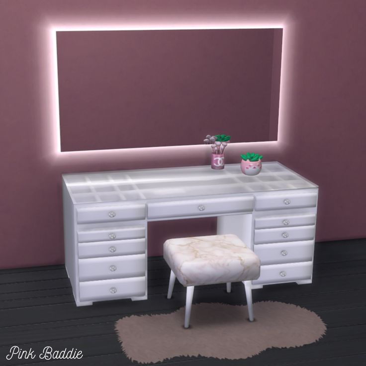 a desk with a stool and mirror in a room that has pink walls on it