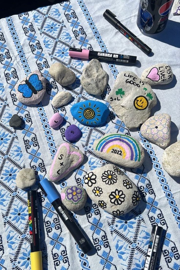 rocks and markers laid out on a table