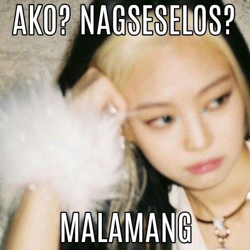 a girl with long hair holding a feather in her hand and the caption says, ako? nageselolos?