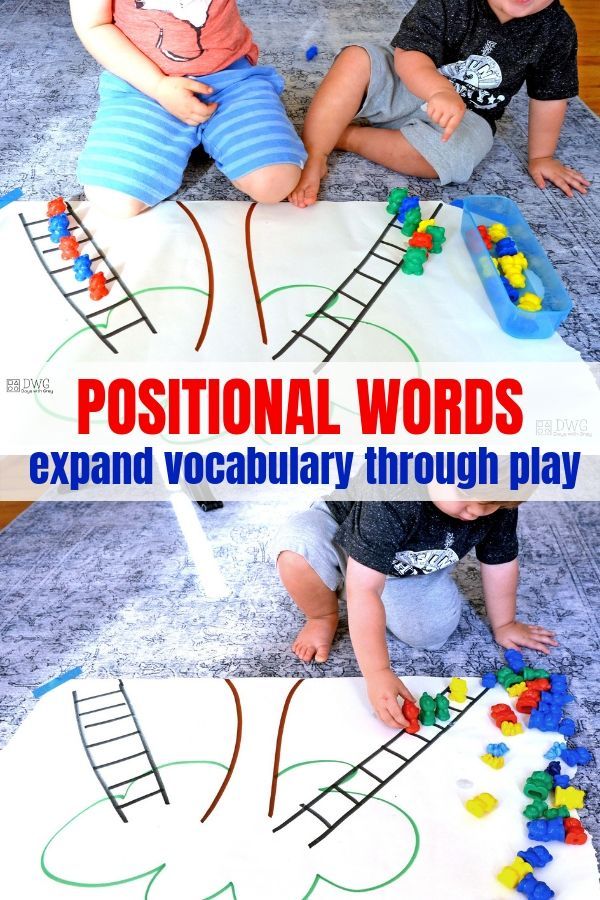 two toddlers playing with toys on the floor in front of a poster that says, positional words expand vocably through play