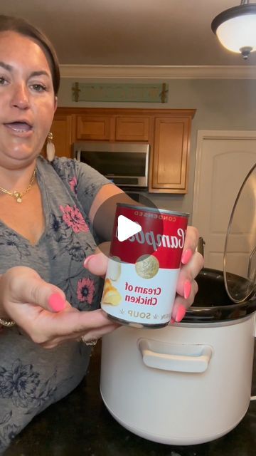 a woman holding an ice cream container in front of a crock pot with the lid open