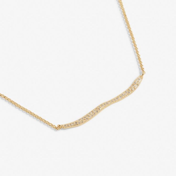 Afterglow Wave Necklace in Gold-Tone Plating | Close Up Chic Gold Rhinestone Necklace For Gift, Chic Gold Crystal Jewelry, Sparkling Cubic Zirconia Chic Jewelry, Chic Sparkling Cubic Zirconia Jewelry, Trendy Gold Crystal Jewelry, Chic Cubic Zirconia Necklace With Adjustable Chain, Party Gold Diamond Necklace With Delicate Chain, Trendy Gold Diamond Jewelry, Gold-plated Necklaces With Diamond Accents For Party