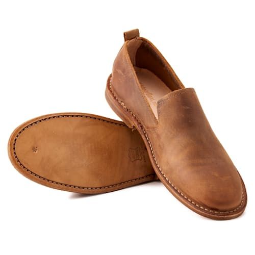 Super-comfortable slip-on shoes, handcrafted in a 6th-generation Italian workshop Slip-on Swift Leather Shoes With Leather Sole, Plain Toe Slip-ons With Leather Sole In Swift Leather, Comfortable Slip-ons With Moc Toe And Leather Sole, Slip-on Leather Shoes With Leather Sole, Comfortable Slip-on Loafers In Swift Leather, Comfortable Slip-ons With Leather Sole In Swift Leather, Comfortable Swift Leather Slip-on Loafers, Comfortable Slip-ons With Rubber Sole And Moc Toe, Slip-on Moccasins With Rubber Sole And Flat Heel