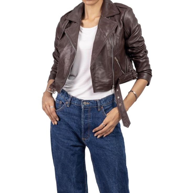 Elevate your wardrobe with our Chic Women's Cropped Leather Jacket. This stylish and versatile outerwear piece is designed for the modern woman who values both fashion and function. Crafted from premium, supple leather, this jacket offers a sleek silhouette that enhances any outfit, whether casual or sophisticated. The cropped cut provides a contemporary twist on the classic leather jacket, making it perfect for layering over dresses, blouses, or even a simple tee. Featuring a tailored fit, zipp Fall Leather Long Sleeve Cropped Jacket, Leather Cropped Jacket With Long Sleeves For Fall, Leather Long Sleeve Biker Jacket For Fall, Chic Brown Leather Cropped Jacket, Trendy Leather Jacket With Long Sleeves, Trendy Leather Cropped Jacket For Winter, Chic Brown Leather Biker Jacket, Modern Brown Leather Jacket For Fall, Fitted Leather Cropped Jacket For Fall