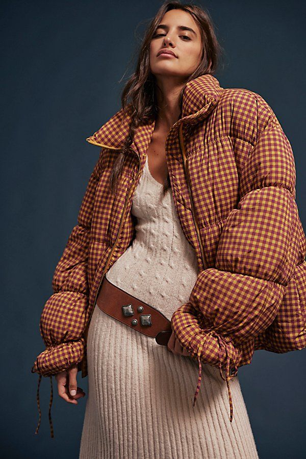 Ultra puffy and printed, this cozy coat is featured in an extra voluminous design for a versatile style that also makes a statement. **Fit:** Relaxed, oversized **Features:** Puffer style, printed nylon fabrication, stand collar, zipper closure, balloon sleeves with tie details at cuffs **Why We | Printed Cotton Candy Puffer Jacket by Free People in Gold, Size: M Stylish Winter Coats, Puffer Style, Fur Collar Jacket, Classy Prom Dresses, Cozy Coats, Puffer Jacket Women, Free People Jacket, Parka Coat, Winter Coats Women