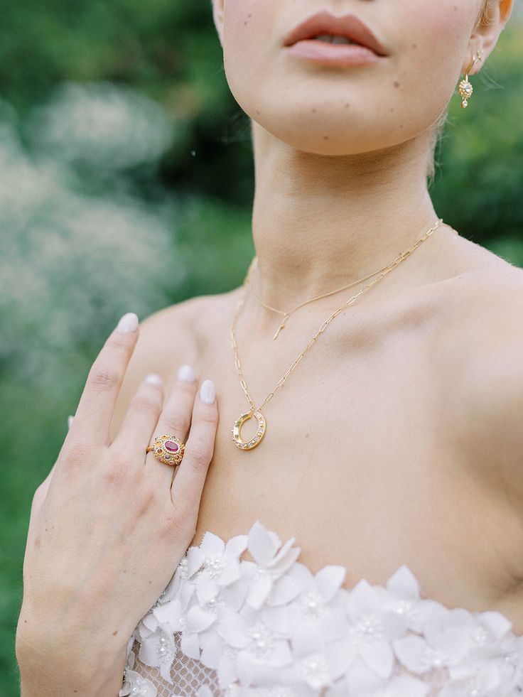 18k Yellow Gold, 1.43 Rhodalite Garnet, 1.50ct Pink Sapphires, and .90CT Orange Sapphires My mother, Jackie O, and Sophia Loren influenced my jewelry aesthetic. All of them have an effortless style worn with incredible statement jewelry. I have emulated their vibe and wear my statement pieces with jeans and a white tee shirt. This aesthetic inspired the 'Pretty in Pink' Ring. The delicate beauty of the sea urchin inspired its design with its inverted gemstones separated by gold beading. I chose Heirloom Recycled Gold Jewelry For Wedding, Gold Ruby Ring With Rose Cut Diamonds For Gift, Gold Ruby Ring With Rose Cut Diamonds As Gift, Fine Jewelry Pink Sapphire With Diamond Cut, Fine Jewelry With Diamond Cut Pink Sapphire, Wedding Jewelry Pink Sapphire With Diamond Cut, Yellow Gold Ruby Jewelry For Wedding, Exquisite Yellow Gold Ruby Ring For Wedding, Gold Ruby Ring With Rose Cut Diamonds For Wedding