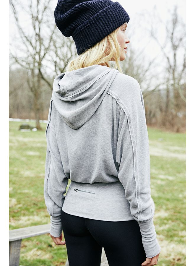 So soft slouchy hoodie featured in an oversized fit with a wide waistband and dolman sleeves. Drawstring hood Ribbed elastic waist detail Exposed seams FP Movement A destination for the life well-lived, Free People Movement offers performance-ready activewear, practice-perfect styles and beyond-the-gym staples. We believe in the power of community, in supporting and lifting each other up and always #movingtogether. Care/Import Machine Wash Cold Import Measurements for size small Bust: 48 in Leng Dolman Jacket Outfit, Dolman Jacket, Free People Activewear, Mommy Style, Belted Jacket, Workout Sweatshirt, Workout Hoodie, Drawstring Hoodie, Wide Waistband