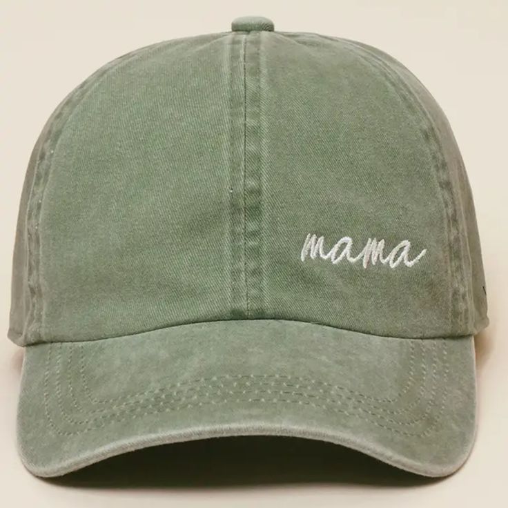 a green hat with the word mama embroidered on it