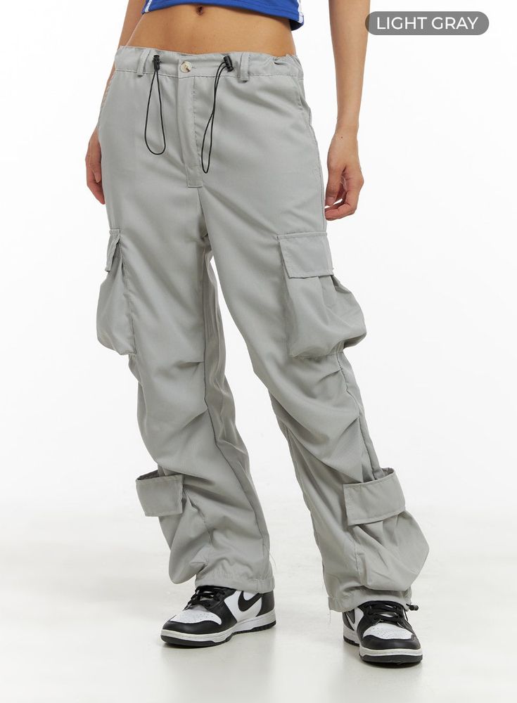 Product Detail Elevate your street style with our Double-Pocketed String Cargo Pants CA423. Perfect for festivals, these cargo pants feature a straight fit and solid print. Add a touch of edge to your wardrobe with these versatile pants. Style : Street, Acubi Occasion : Festival Detail : Cargo, Pockets, String Print : Solid Material : Polyester Fit : Straight fit Polyester100 Color : Light gray Model Size Model is wearing size S/M and the color Light gray. Height : 5'7" | 169cm / Top : XS / Bott Baggy Gray Cargo Pants With Pockets, Gray Baggy Cargo Pants For Outdoor, Outdoor Gray Cargo Pants, Gray Full-length Cargo Pants With Cargo Pockets, Gray Cargo Pants With Multiple Pockets For Outdoor, Gray Full Length Cargo Pants, Outdoor Cargo Pants With Side Pockets In Gray, Urban Gray Cargo Pants With Pockets, Gray Utility Cargo Pants With Multiple Pockets