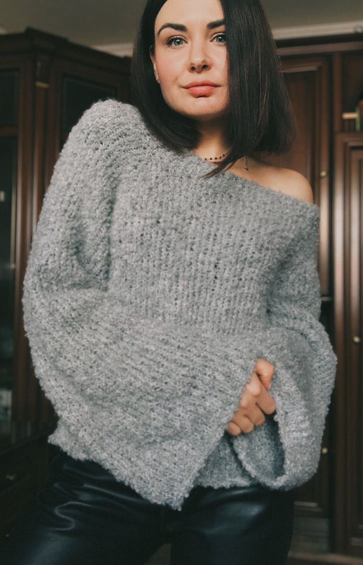 Gray oversized wide sleeve sweater for women. Hand knit off shoulder alpaca boucle sweater. Hand knit chunky cropped sweater. Hand knit oversized alpaca sweater in silver gray (as shown) MADE TO ORDER Yarn composition: 15% alpaca, 30% wool, 55% acrylic Color (as shown): silver gray SIZE CHART SIZE XS:  Width:46-47 cm Length:46-48 cm Size S:  Width: 47-49 cm Length: 46-48 cm Size M: Width: 48-50 cm Length: 48-50 cm Size L: Width: 50-52 cm Length: 48-50 cm Chic Oversized Chunky Knit Cropped Sweater, Chic Oversized Cropped Sweater In Chunky Knit, Chic Chunky Knit Cropped Sweater For Winter, Oversized Knit Cropped Sweater, Slouchy Cozy Cropped Sweater For Fall, Cozy Slouchy Cropped Sweater For Fall, Soft Textured Long Sleeve Cropped Sweater For Winter, Soft Textured Long Sleeve Cropped Winter Sweater, Chic Oversized Cropped Sweater For Winter