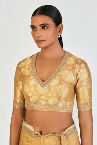 Gold yellow silk blouse with marodi and gold zari embroidery. - Aza Fashions Traditional Gold V-neck Tops, Yellow Resham Embroidered Top For Wedding, Festive Yellow Top With Resham Embroidery, Designer Gold Embroidered Blouse Piece, Elegant V-neck Tops With Zari Work, Elegant Semi-stitched Tops For Diwali, Festive V-neck Tops With Zari Work, Elegant V-neck Top With Zari Work, Gold V-neck Blouse For Wedding