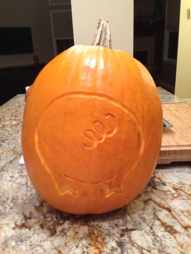 a carved pumpkin sitting on top of a counter