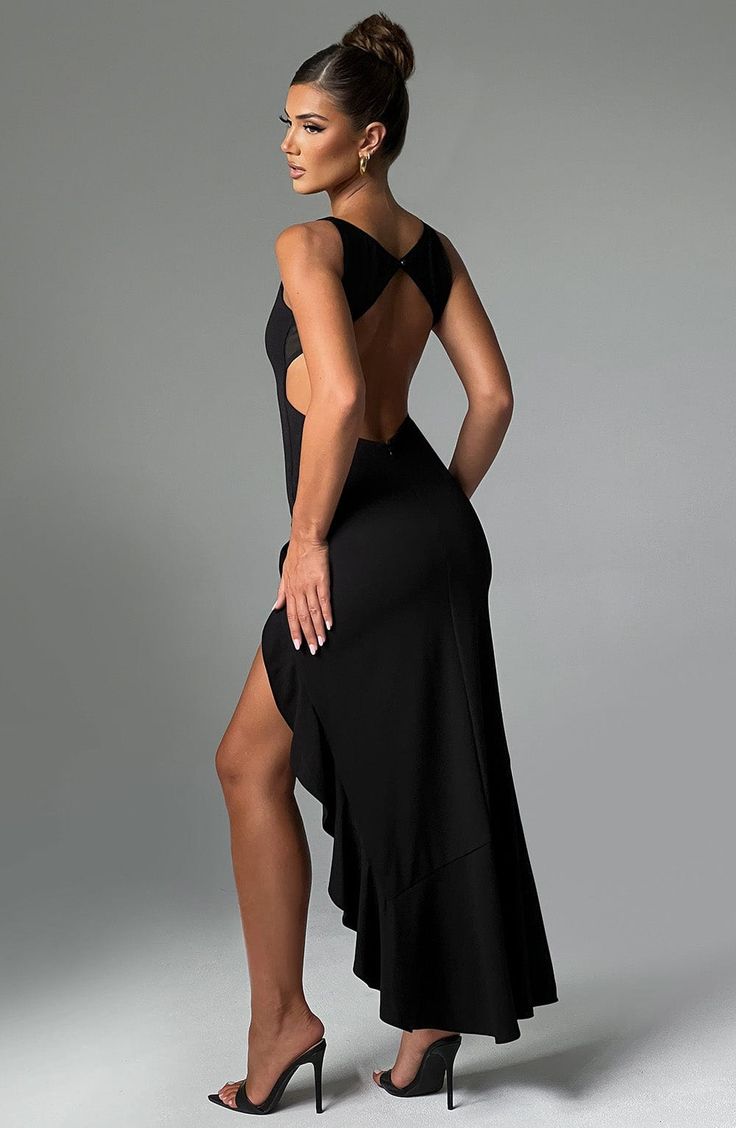 The Theodora maxi was made for special events, parties and late nights. Crafted in our premium double stretch crepe which moulds to your figure, this high neck dress features a super low back with delicate mesh panels and a double frill detail skirt. Wear yours with sleek, straight hair and silver jewellery. 



Colour: Black.

Premium stretch crepe.

Fully lined.

Moulds to body figure.

Double frill detail.

Thigh high split.

Super low back.

High neckline.

Mesh panels on back.

Invisible zi Sleek Straight Hair, Homecoming Dresses Corset, Midi Dress Wedding Guest, Dresses Flowy, Body Figure, Maxi Dress Sale, Sparkle Dress, Stretch Crepe, Dresses By Length