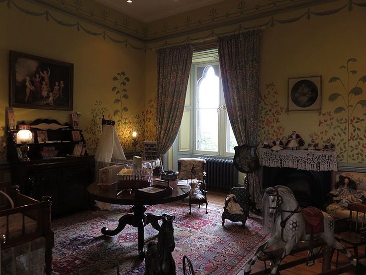 a living room filled with furniture and decor