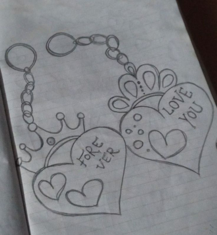 a drawing of two hearts with the words i love you written on them and a keychain attached to it