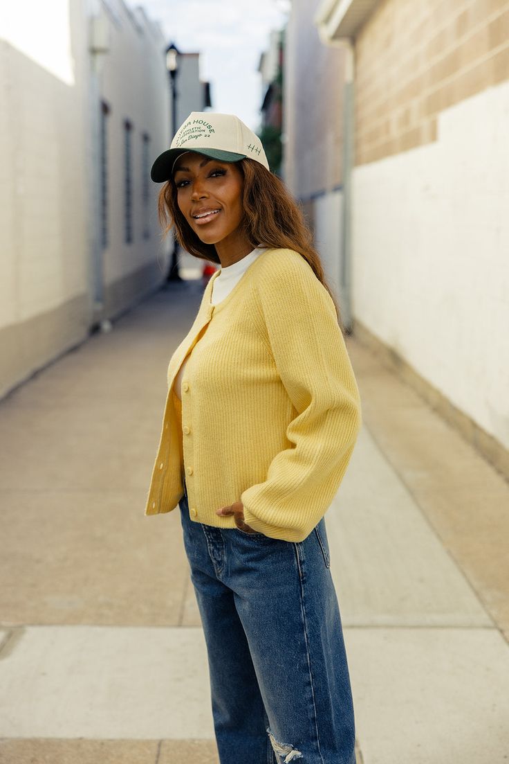 And it was all yellow... This medium weight cardigan features raglan sleeves, a button front, and ribbed hemlines. This luxurious cardigan is one that you will have for years to come! balloon sleeves medium weight // paired with free people deep trance dropped boyfriend jeans Spring Cardigan With Ribbed Cuffs For Everyday, Spring Daywear Ribbed Cardigan, Ribbed Cardigan For Spring Daywear, Spring Ribbed Cardigan For Daywear, Casual Ribbed Cardigan For Daywear, Ribbed Cardigan For Everyday Spring Wear, Ribbed Spring Cardigan For Everyday, Casual Yellow Sweater With Button Closure, Casual Yellow Cardigan For Day Out