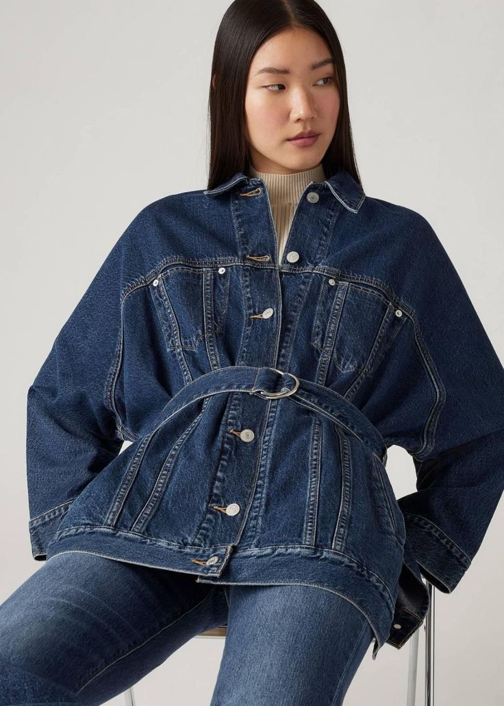 The Levi's Belted Dolman Trucker Jacket makes an outfit. You'd be hard-pressed to find a jacket with an easier shape, more versatile weight or inherent sense of cool. Bonus: This cut features a longer length and venting on the sides for added breathability. 100% Cotton Relaxed Fit An homage to the iconic Levi’s® Trucker Jacket Constructed with a longer length and venting on the sides With a belted design Destroyed Denim, Trucker Jacket, Wide Brimmed Hats, Jacket Design, Sweater Blouse, A Jacket, Jacket Dress, Farmer, Jumpsuit Dress