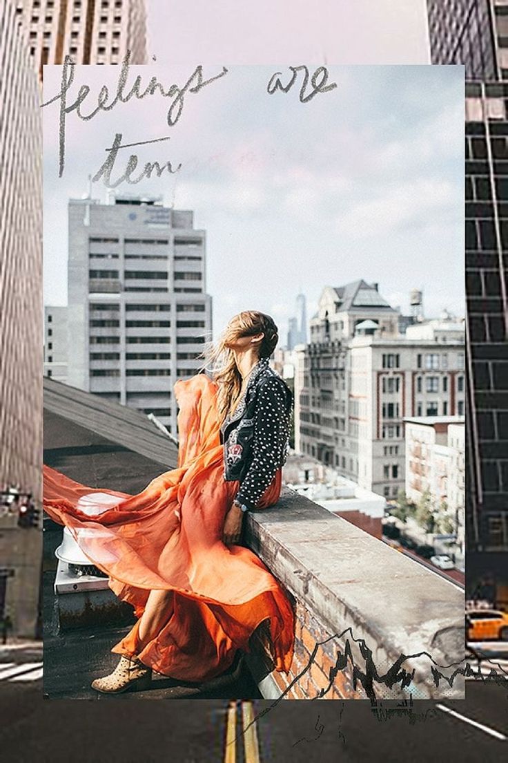 a woman standing on top of a building next to tall buildings with the words feelings are them