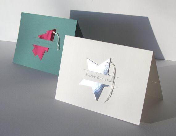 two greeting cards, one with an origami arrow