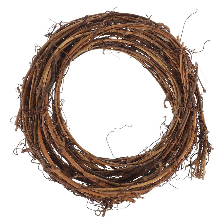 a wreath made out of twigs on a white background