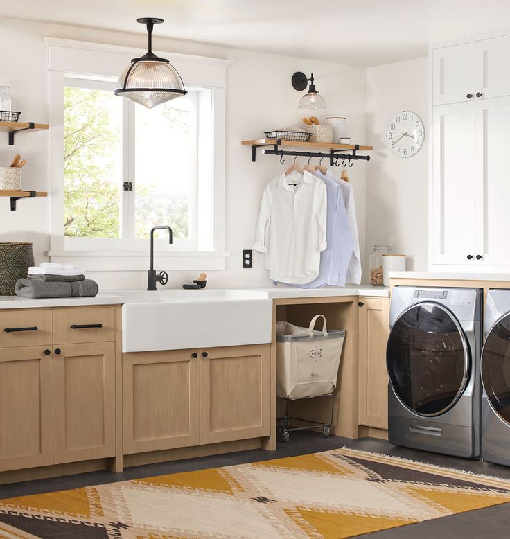 a washer and dryer in a small room