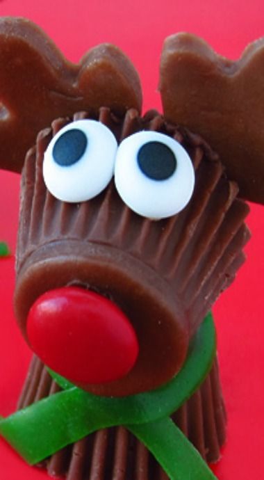 a close up of a cupcake decorated to look like a reindeer