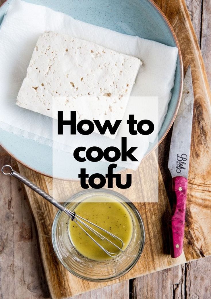 how to cook tofu on a cutting board with a whisk in a bowl