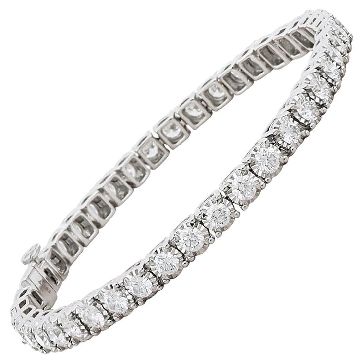 An elegant 18 karat gold tennis bracelet featuring a stream of brilliance that embraces the wrist. This round cut diamond bracelet, set in white gold celebrates the purity of the finest diamonds showcased in truly enduring jewels. 18 Karat White Gold Bracelet Size: 19 cm Diamond (Total Carat Weight: 5.03 ct) Color and clarity: H, VS Weight: 16 Gold Tennis Bracelet, Expensive Jewelry Luxury, Bracelet Tennis, Modern Bracelets, White Gold Bracelet, Expensive Jewelry, Tennis Bracelet, Round Cut Diamond, Bracelet Sizes