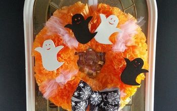 a wreath with halloween decorations on it