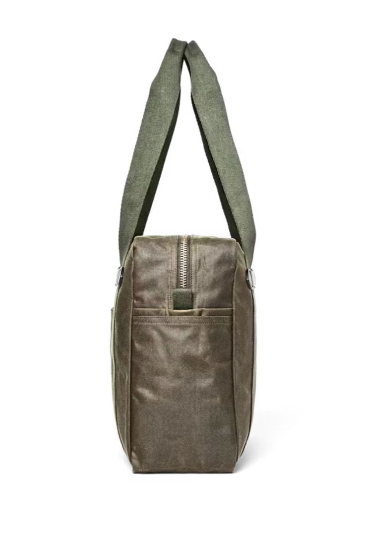 Filson Tin Cloth bags are made for traveling light and fast, with all of the weather resistance and durability that’s made our bags legendary. Whether for a round of sporting clays, an airline carry-on or daily carry needs, the versatility of our Tin Cloth Tote Bag with Zipper is unmatched. This lighter-weight variation of our iconic zippered tote is built to withstand the rigors of rugged use for years of service. Made with durable Tin Cloth waxed cotton and nylon-lined Metal YKK® zipper Fully nylon-lined Front and side stow pockets Cotton webbing handles Khaki Shoulder Bag For Outdoor Activities, Casual Brown Bag With Reinforced Handles, Tote Shoulder Bag With Zipper Pocket For Outdoor Activities, Outdoor Tote Shoulder Bag With Zipper Pocket, Outdoor Activities Tote Shoulder Bag With Zipper Pocket, Khaki Satchel Bag With Zipper Pocket, Brown Bag With Double Reinforced Handles, Brown Double Handle Bag With Reinforced Handles, Casual Leather Bags For Outdoor Activities