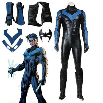 the blue beetle costume is shown in full body armor and boots, with accessories for him