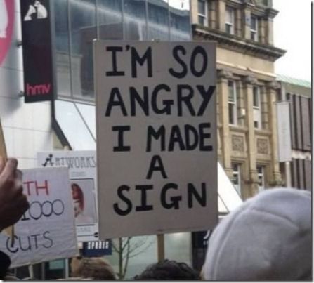 a person holding up a sign that says i'm so angry i made a sign