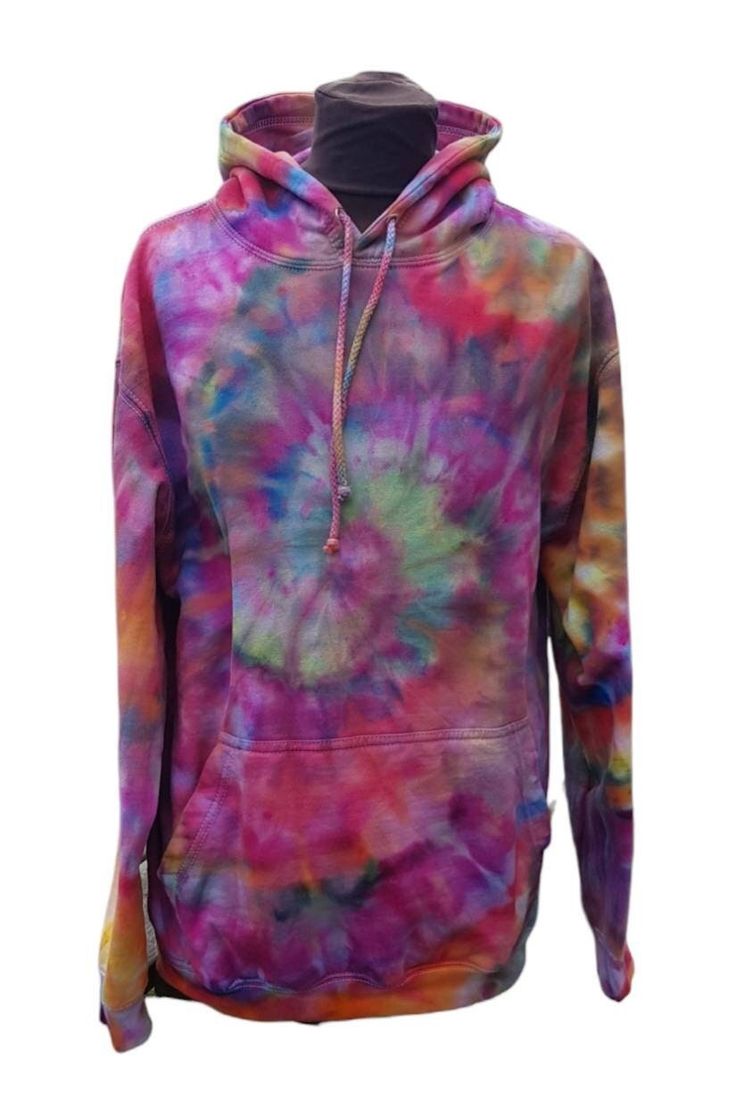 Make a bold statement with this unisex ice tie dye hoodie! Available in adult and children sizes, this dyed hoodie features a unique spiral pattern, ice tie dye, and customisable colours. For an exciting and one-of-a-kind look, you won't find elsewhere! Please message us if you require children sizes. Only professional dyes are used on our products that bind to the cotton fibres of the product. This ensures that the items do not fade with washing or over time. The dyes are Vegan and non-toxic. O Tie-dye Relaxed Fit Hoodie For Streetwear, Tie Dye Relaxed Fit Hoodie For Streetwear, Casual Tie Dye Hoodie With Drawstring, Casual Tie-dye Sweatshirt With Drawstring Hood, Casual Tie Dye Sweatshirt With Drawstring Hood, Trendy Tie Dye Sweatshirt For Streetwear, Casual Tie Dye Hoodie With Relaxed Fit, Trendy Tie-dye Hoodie For Winter, Trendy Tie Dye Winter Hoodie