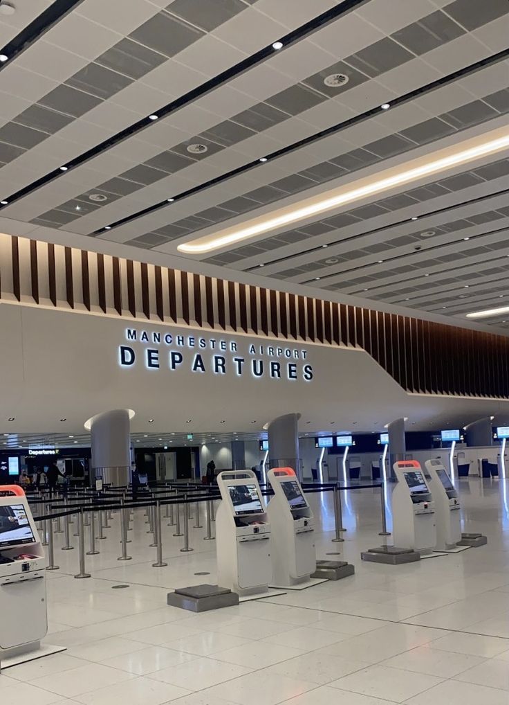 an airport terminal with multiple turns and luggage carousels in front of the sign that says, magnetic air departures