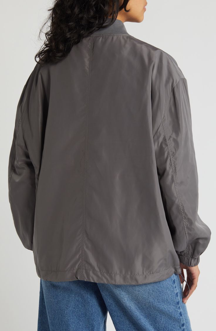 This lustrous bomber jacket is perfect for keeping you cozy during the cooler seasons with handy pockets, a drawstring hem and a ribbed blade collar. 27" length (size medium) Front zip closure Blade collar Elastic cuffs Chest zip pocket; front snap-flap pockets Drawcord-toggle hem 100% polyester Machine wash, dry flat Imported Flap Pocket, Charcoal Grey, Zip Pockets, Bomber Jacket, Nordstrom, Collar