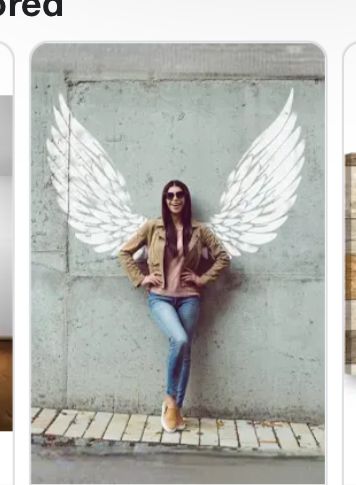 three different pictures with white angel wings on the wall and in between them is a woman wearing sunglasses