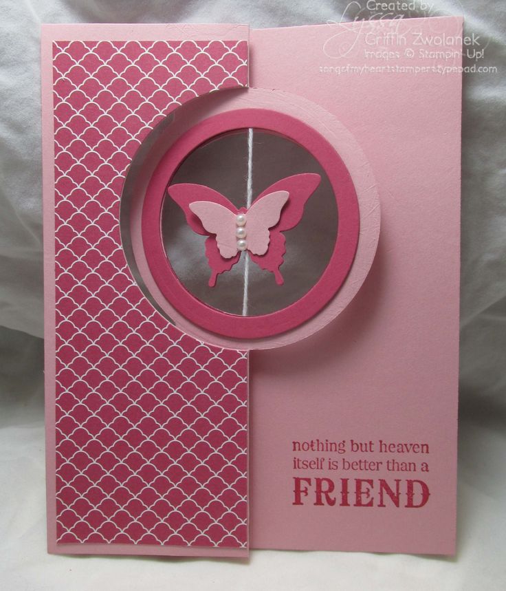 a pink card with a butterfly on it