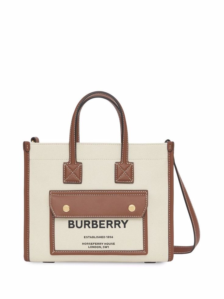 cream/brown cotton/leather logo print to the front contrasting trim gold-tone hardware two top handles adjustable detachable shoulder strap snap fastening main compartment front flap pocket Burberry Tote Bag, Burberry Tote, Burberry Models, Mini Tote Bag, Burberry Women, Mini Tote, Coach Swagger Bag, Leather Mini, Canvas Leather