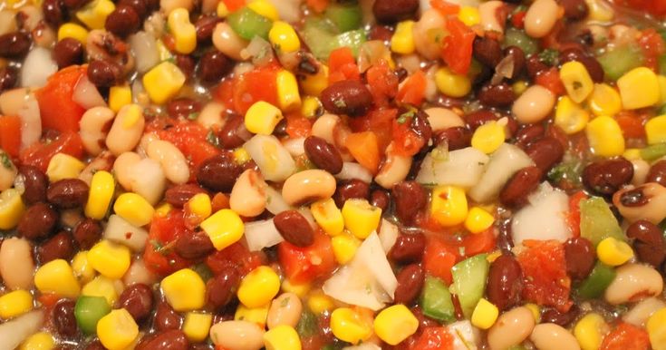 a mixture of beans, corn and peppers