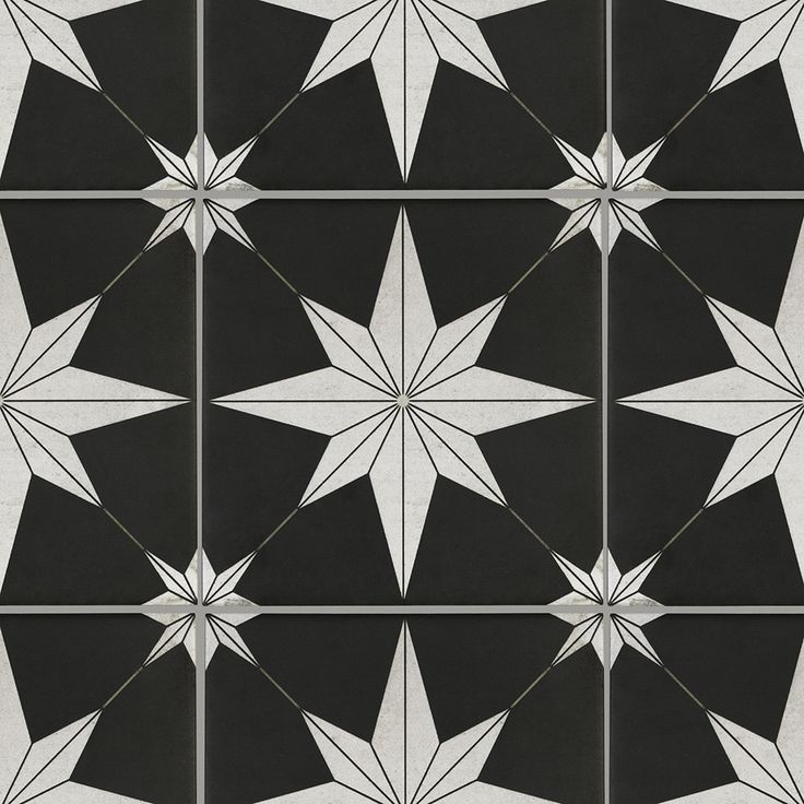 a black and white tile pattern with stars on the bottom, one star is in the middle