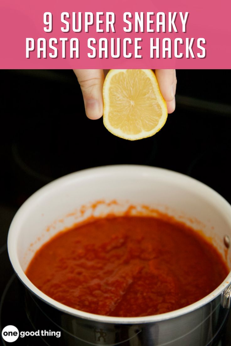 a person holding a lemon slice over a bowl of sauce with the words 9 super sneaky pasta sauce hacks