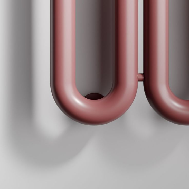 the letters o and u are made out of pink plastic tube ends, with an oval hole in the middle