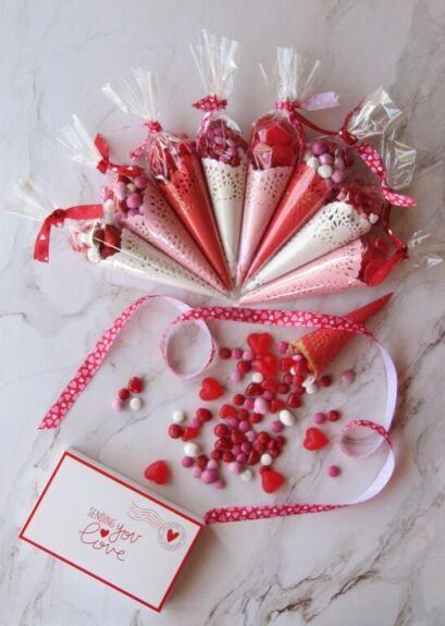 valentine's day gift set on marble countertop with card and candy wrapper