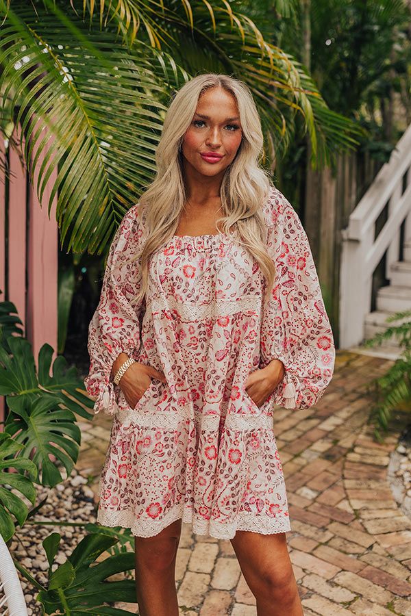 - Embrace the boho spirit with this dreamy dress! - Lined material with an abstract floral print featuring reds and pinks - An elastic scoop neckline - Loose ¾ length sleeves with drawstring closure cuffs featuring tassel accents - Crochet detail - Hidden side pockets - A flowy silhouette that ends in a mini dress length hemline Abstract Floral Print, Crochet Details, Dreamy Dress, Floral Mini Dress, Abstract Floral, Scoop Neckline, Length Sleeve, Dress Length, Floral Prints