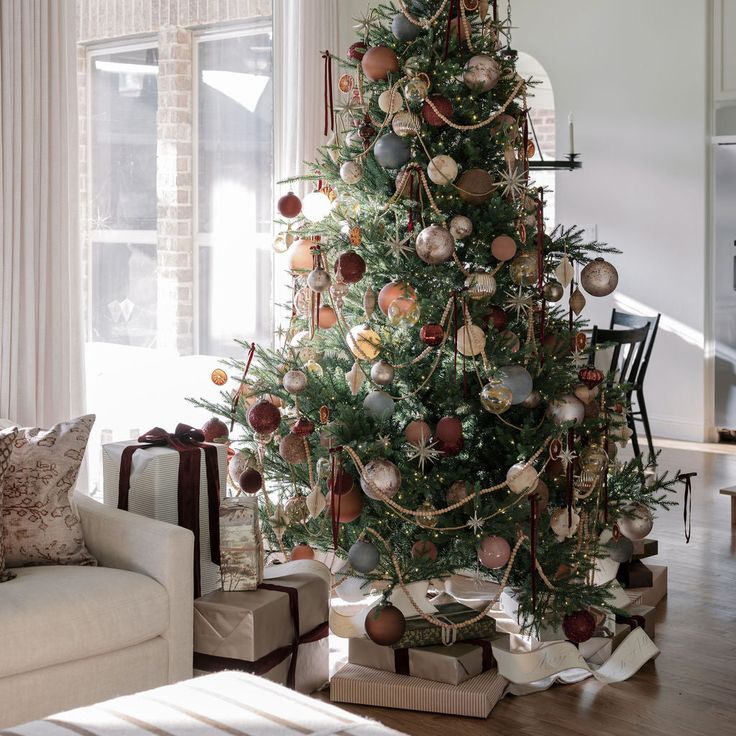 a decorated christmas tree in a living room